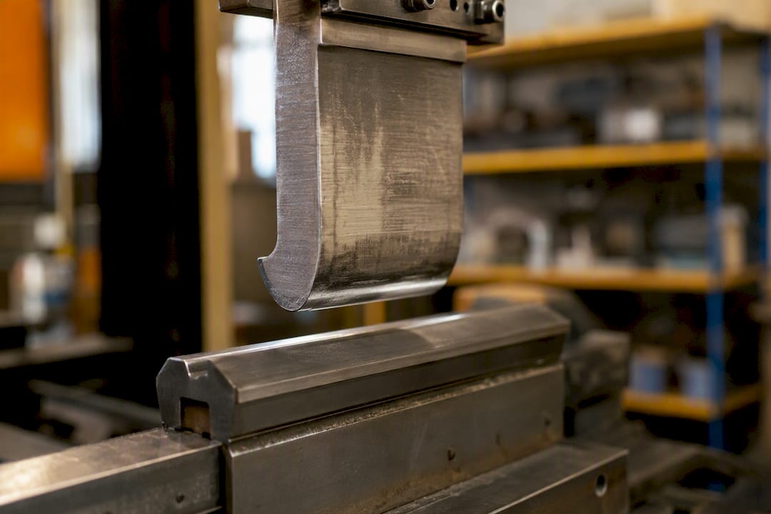 Close-up of press brake punch radius detail