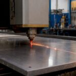 Laser beam cutting steel sheet closely