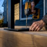 Fixation métallique sur une solive en bois