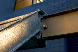 Galvanized exterior stair joint with stainless fastener