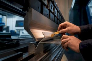 Precision press brake forming sheet metal flange
