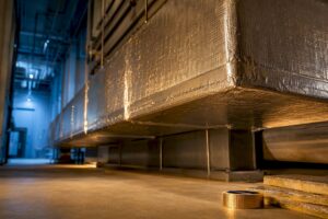 Foil-faced insulation around commercial ductwork