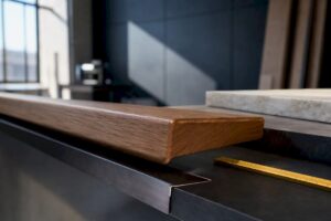Contrasting wood and metal stair tread details