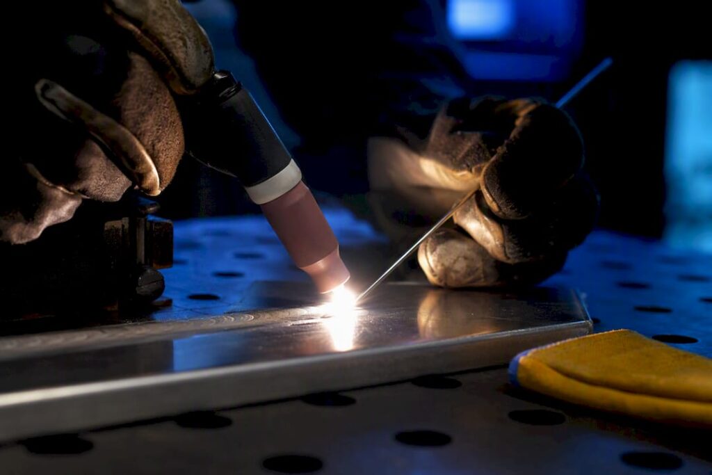 TIG torch welding a thin aluminum coupon