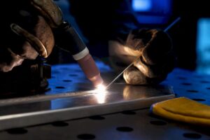 TIG torch welding a thin aluminum coupon