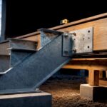 Metal stair stringer deck connection detail