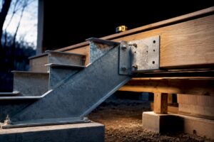 Metal stair stringer deck connection detail