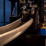 Steel channel passing through profile rolling machine