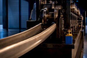 Steel channel passing through profile rolling machine