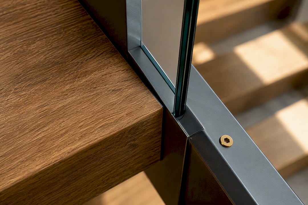 Wood, glass and metal stair detail