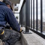 Custom balcony railing anchored to concrete slab