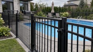 Metal fence enclosing a residential swimming pool