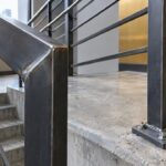 Steel railing with welded and bolted connections