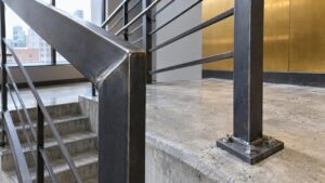 Steel railing with welded and bolted connections