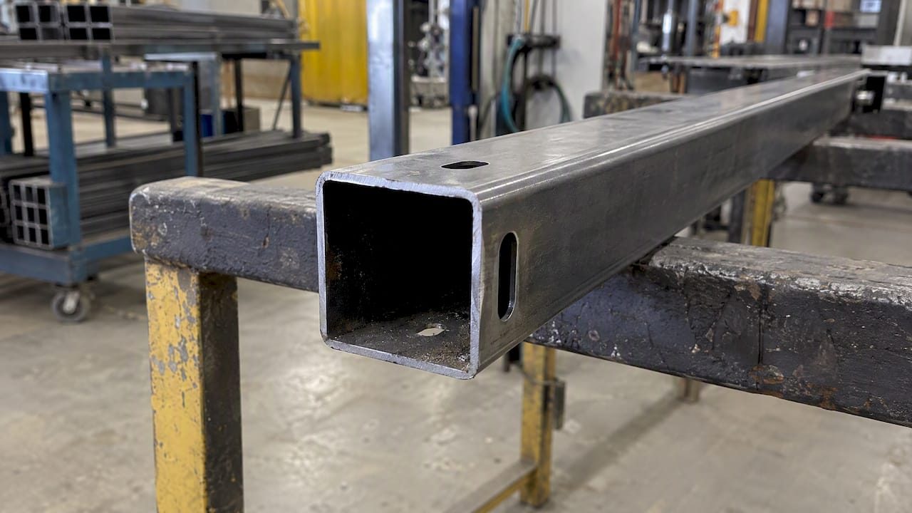 Vent and drain openings in hollow railing tube